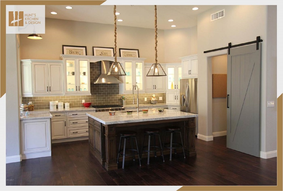 Kitchen with white cabinets and countertop