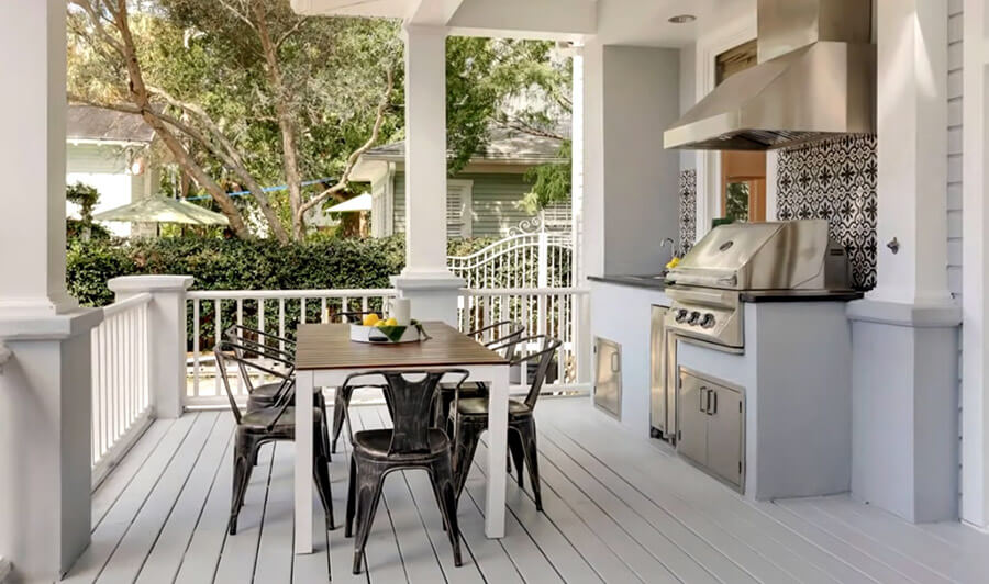 outdoor kitchen with sitting table