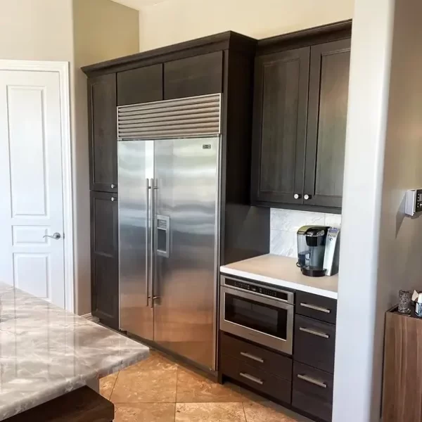 Stainless steel fridge in Transitional Kitchen