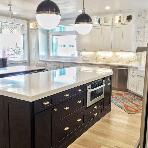 white glass front cabinets with light